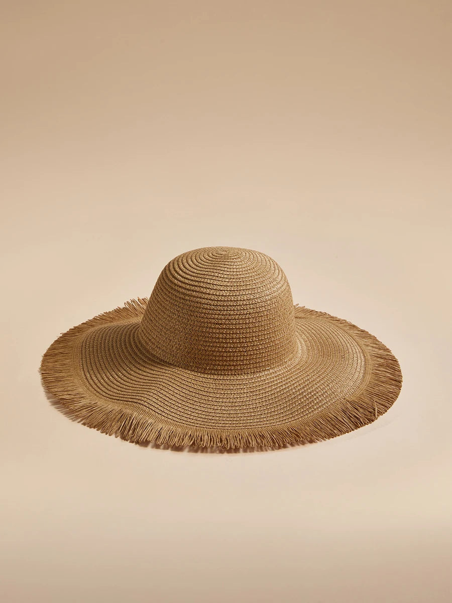 Oversized Woven Straw Sun Hat with Fringe Trim for Beach Travel and Resort Styling