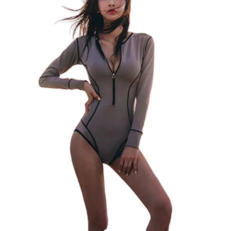 Long-Sleeve Black One-Piece Swimsuit with Deep V-Neck, Triangle Front and Sleek Monokini-Inspired Beachwear Design