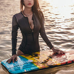 Long-Sleeve Black One-Piece Swimsuit with Deep V-Neck, Triangle Front and Sleek Monokini-Inspired Beachwear Design