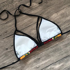 Vibrant Geometric Print High-Waisted Bikini with Strappy Cutout Details