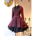 Black Gothic-Inspired Coat Dress with Cream Layered Skirt and Red Shoulder Detail