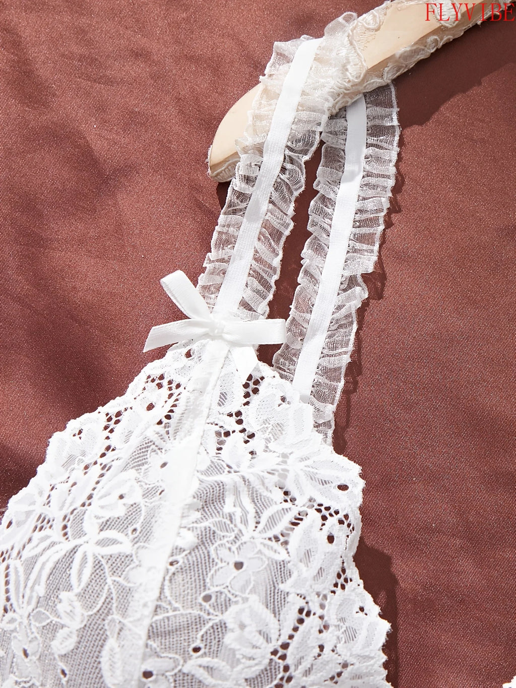 White Sheer Lace Camisole and Thong Lingerie Set with Delicate Straps, Floral Lace Detailing and Split-Hem Silhouette