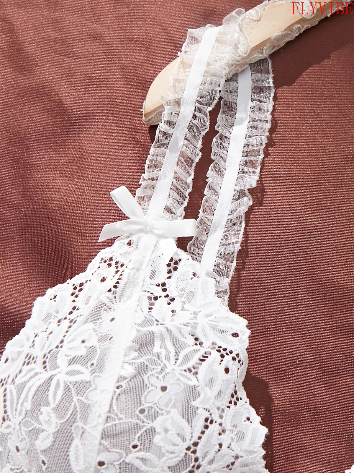 White Sheer Lace Camisole and Thong Lingerie Set with Delicate Straps, Floral Lace Detailing and Split-Hem Silhouette