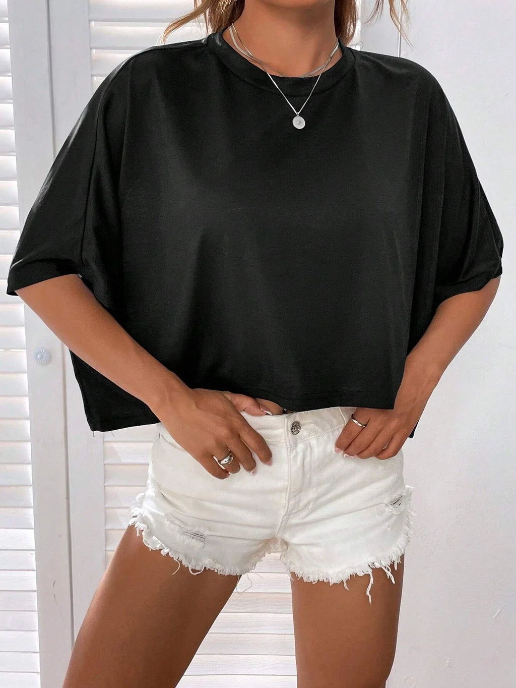 Batwing Sleeve Crop Tee with Relaxed Silhouette and Casual Streetwear Style
