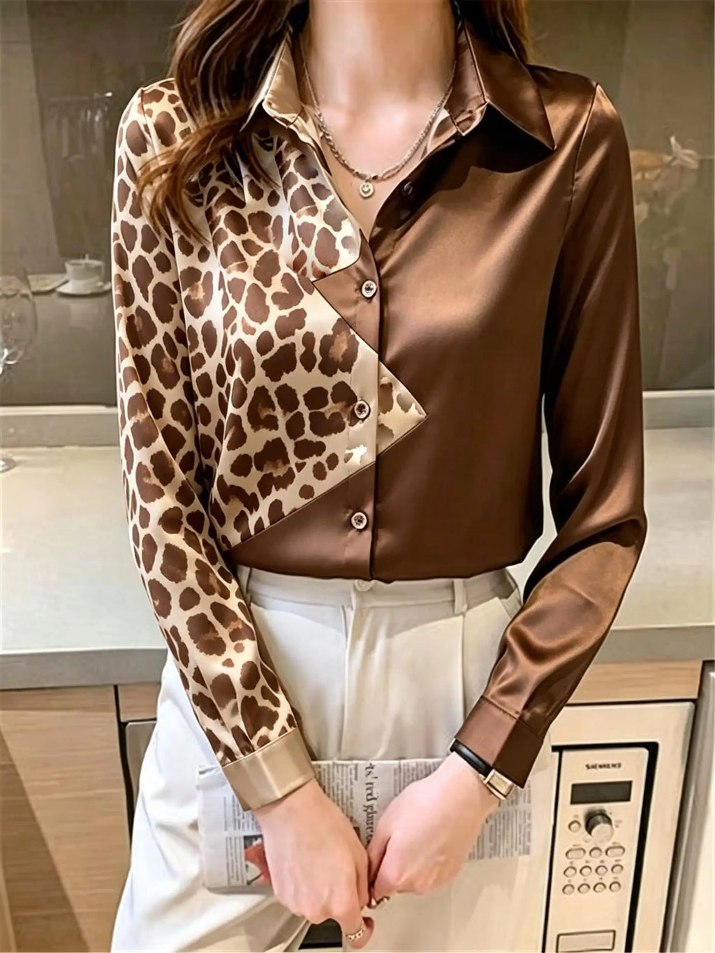 Dynamic Leopard Print and Solid Black Spliced Button-Down Blouse