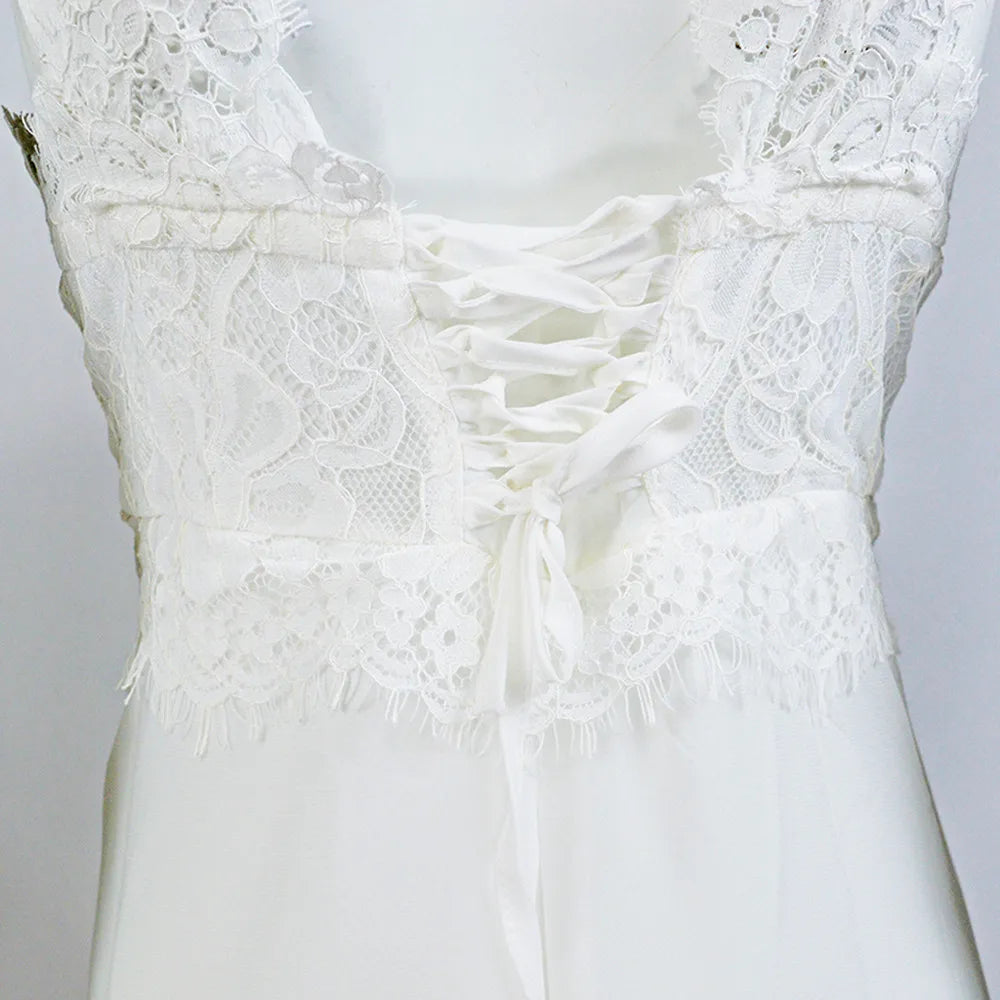 Open Back Floor Length Dress With Soft Structured Draping