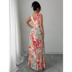 Vibrant Floral Pleated Maxi Dress with Deep V-Neck and Thigh-High Slit