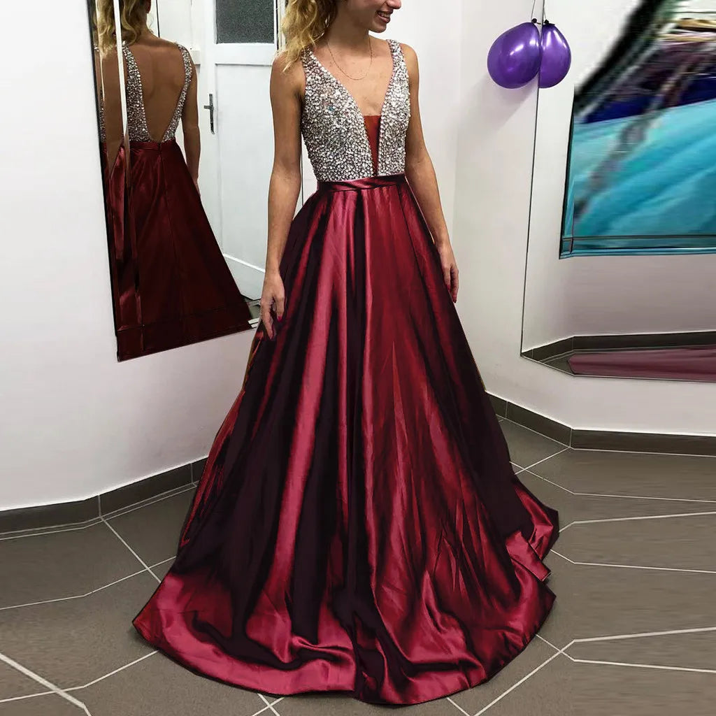Deep V Maxi Dress With Textured Bodice And Flowing Skirt