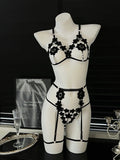 Bold Black Strappy Open-Cup Lingerie Set with Floral Appliqués and Leg Harnesses