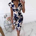 Form-Fitting Black Floral Midi Dress with Flutter Sleeves and Ruched Side Detailing