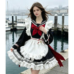 Classic Long-Sleeve Sailor Maid Dress with Ruffled Apron and Crimson Bow