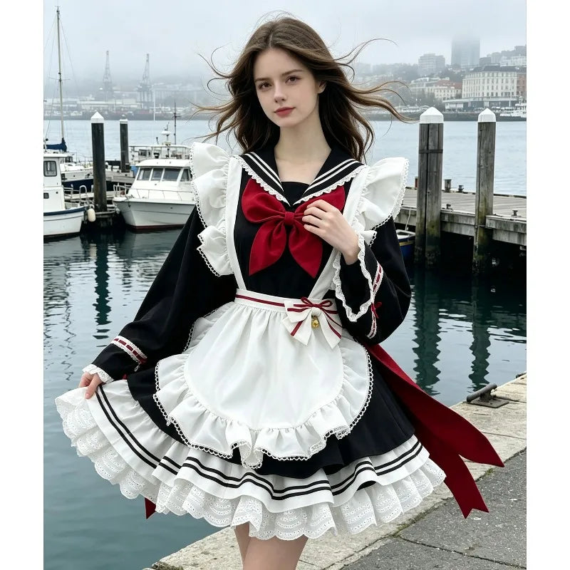 Classic Long-Sleeve Sailor Maid Dress with Ruffled Apron and Crimson Bow