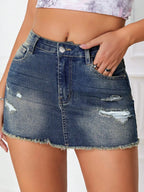 Low Rise Distressed Denim Mini Skirt with Frayed Hem Pocket Detail