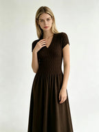 Elegant Short-Sleeve Smocked A-Line Midi Dress in Classic Black