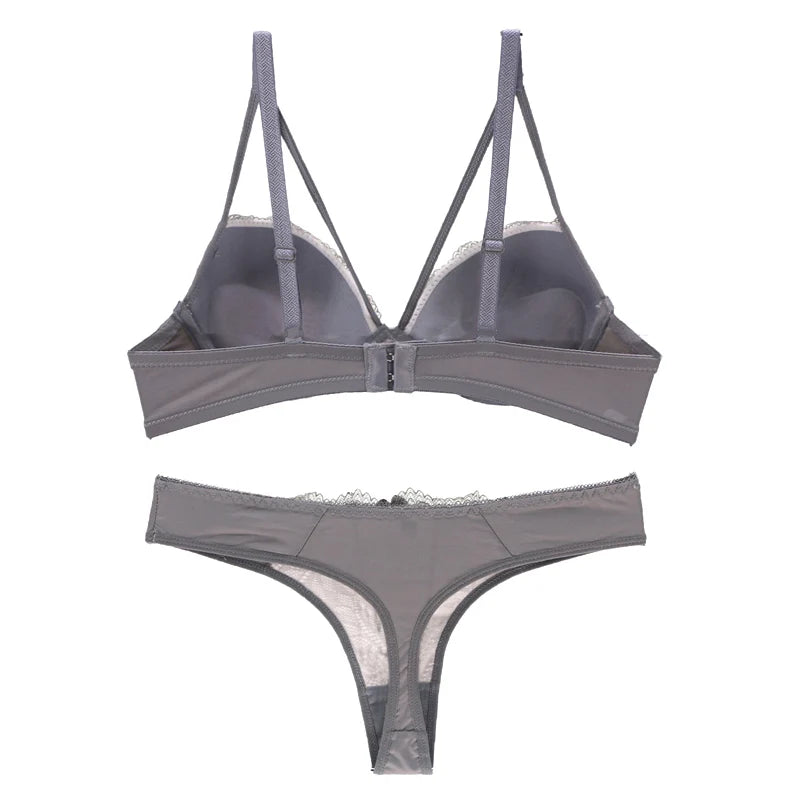 Sophisticated Navy Blue Embroidered Push-Up Bra and Thong Set with Strappy Accents