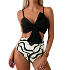 Vibrant Orange Bowknot Bikini Top with High-Waisted Tropical Print Bottom