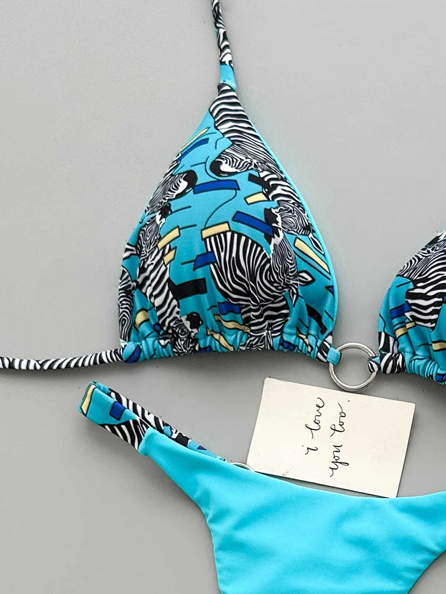 Mixed-Media Abstract Print and Turquoise String Bikini with Metallic Hardware