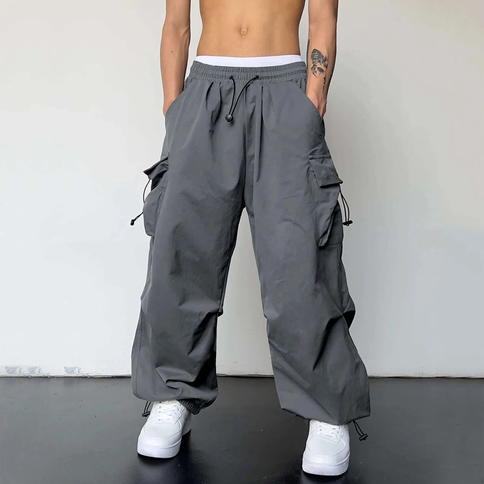 Men's Relaxed Cargo Pants with Multi-Pocket Design and Adjustable Hem