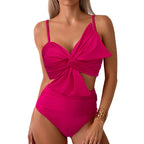 Vibrant Orange Bowknot Bikini Top with High-Waisted Tropical Print Bottom