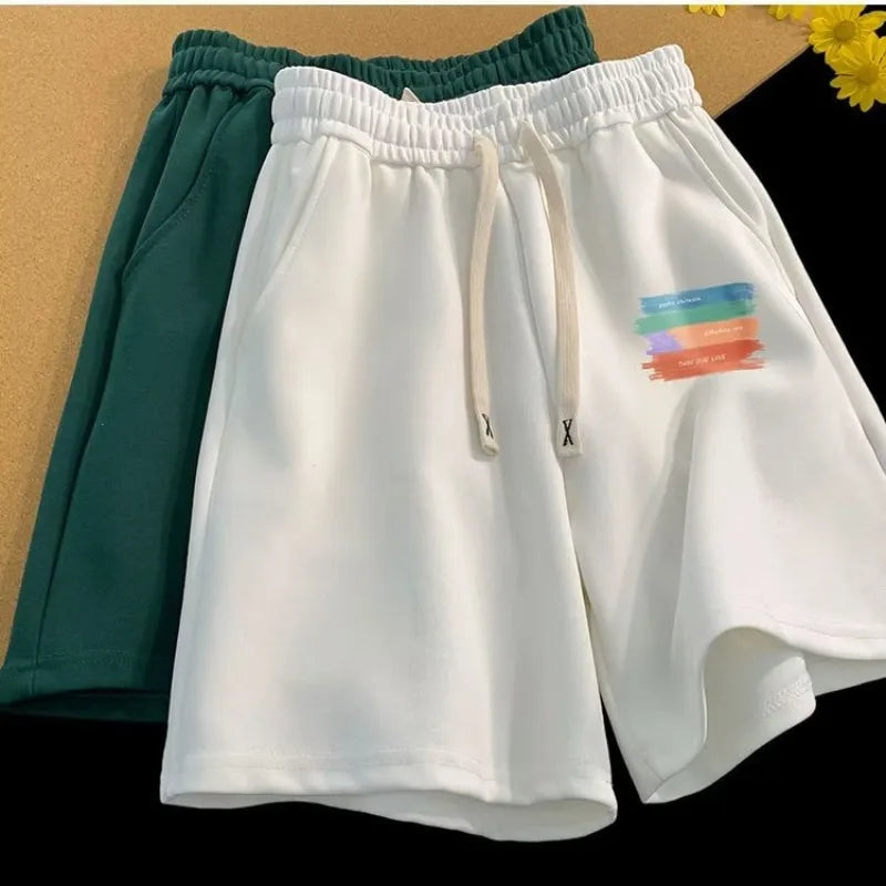 Relaxed Fit Drawstring Streetwear Shorts with Graphic Detail and Athletic Silhouette