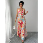 Vibrant Floral Pleated Maxi Dress with Deep V-Neck and Thigh-High Slit