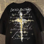 Oversized Script Cross Graphic Cotton T-Shirt with Artistic Streetwear Design