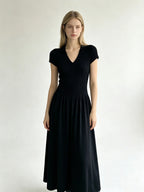 Elegant Short-Sleeve Smocked A-Line Midi Dress in Classic Black