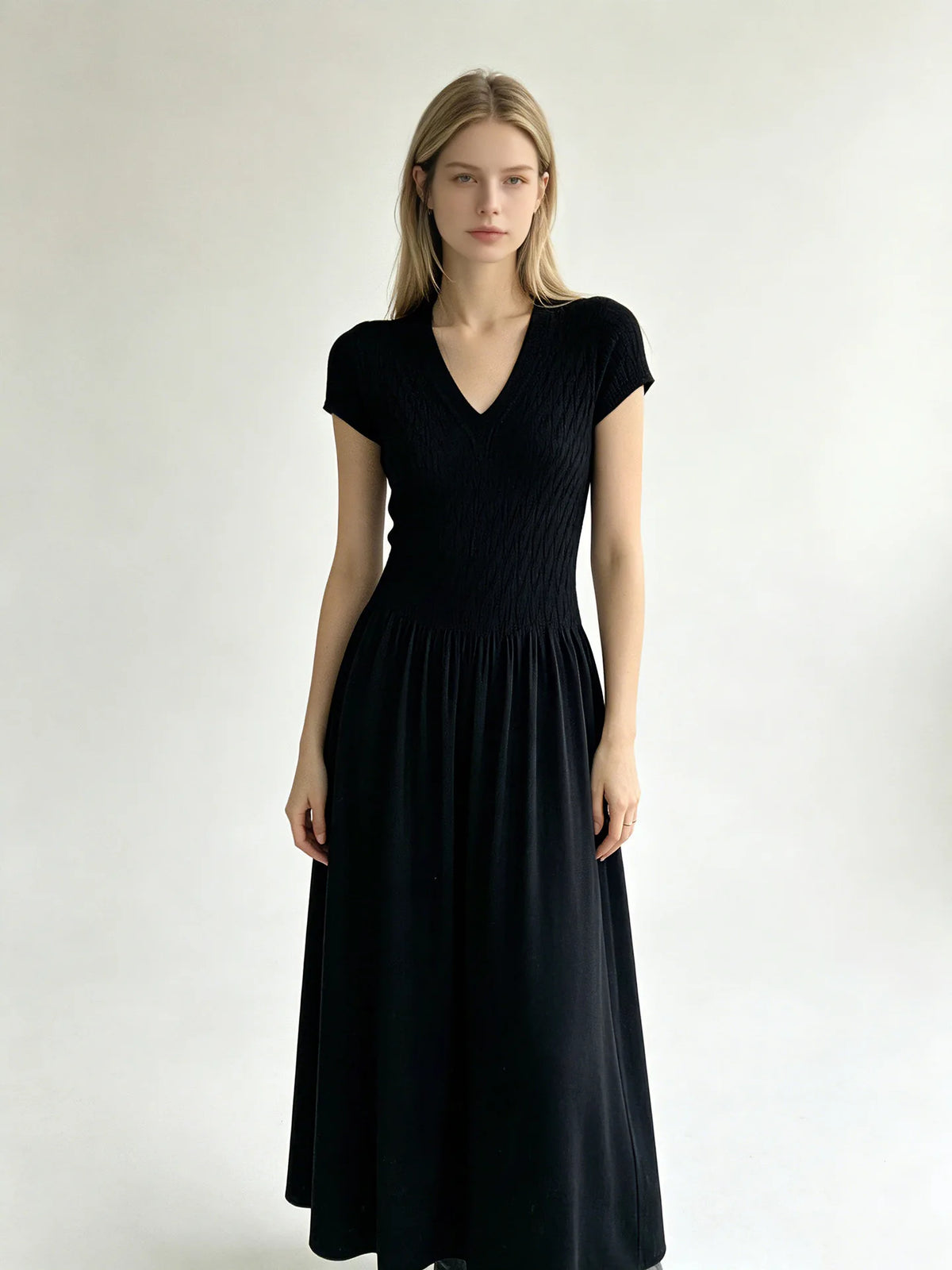 Elegant Short-Sleeve Smocked A-Line Midi Dress in Classic Black