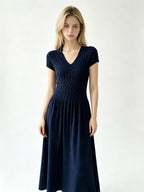 Elegant Short-Sleeve Smocked A-Line Midi Dress in Classic Black