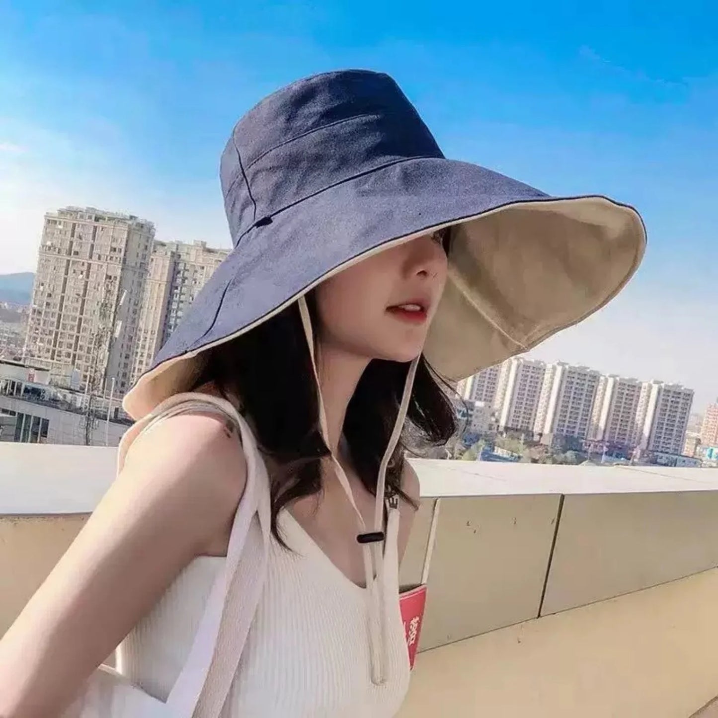 Wide Brim Foldable Sun Hat with UPF Protection and Adjustable Chin Strap for Outdoor Wear
