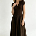 Elegant Short-Sleeve Smocked A-Line Midi Dress in Classic Black