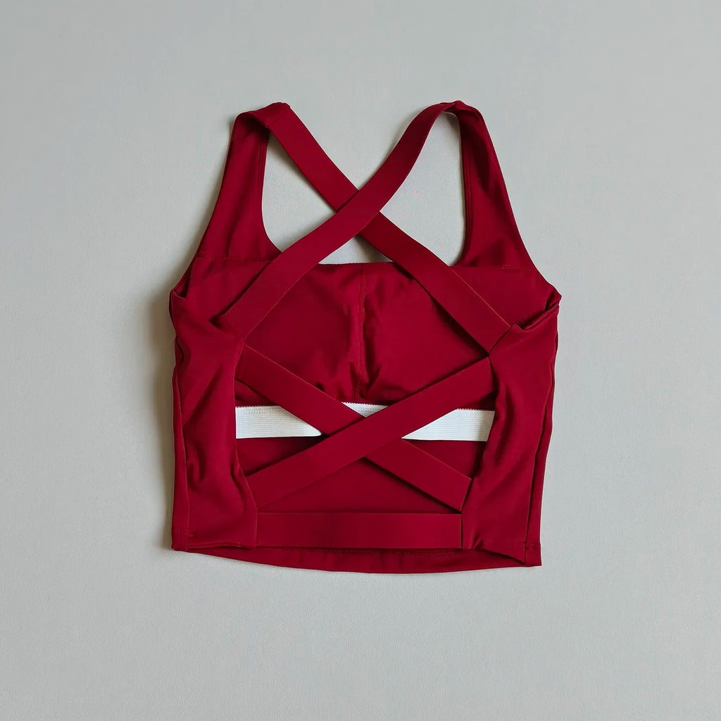 High-Coverage Sports Bra with Architectural Criss-Cross Strappy Back