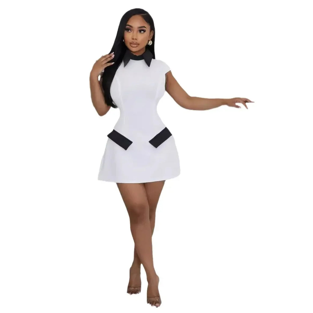 High-Contrast Mod Mini Dress with Pointed Collar and Faux Pocket Details