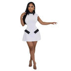 High-Contrast Mod Mini Dress with Pointed Collar and Faux Pocket Details