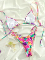 Vibrant Abstract Print Triangle String Bikini with Multi-Strap Cutout Bottoms