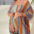 Vibrant Striped Four-Piece Swimwear Ensemble with Flowing Fringed Cover-Up