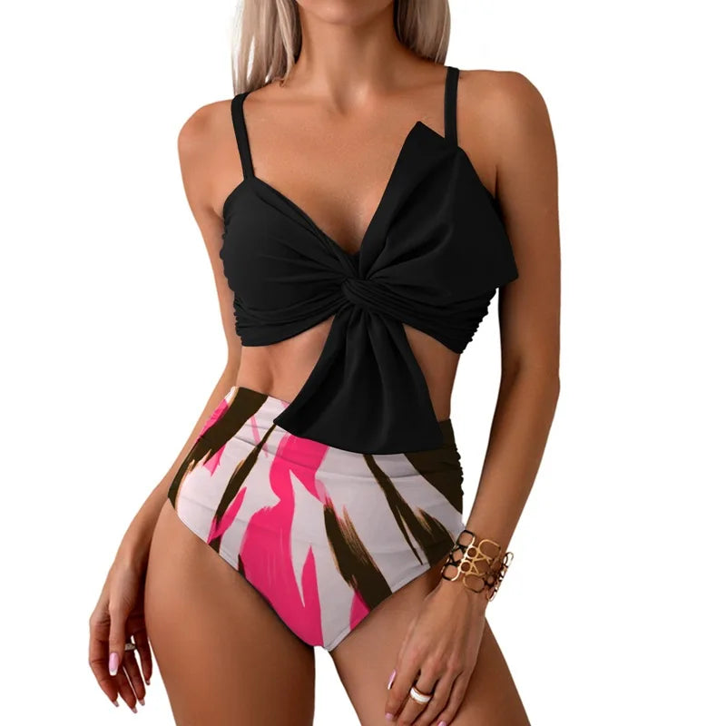 Vibrant Orange Bowknot Bikini Top with High-Waisted Tropical Print Bottom
