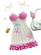Playful Coastal Crochet-Style Mini Dress with Pink Ruffled Hem and Starfish Appliques