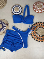 Vibrant Orange Three-Piece Swimwear Set with Ruched Bralette and Cover-Up Skirt