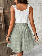 Lace Detail Sleeveless V-Neck Mini Dress with Defined Waist Silhouette