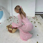 Three-Piece Swimwear Set with Pink Bikini and Sheer Long-Sleeve Maxi Cover-Up