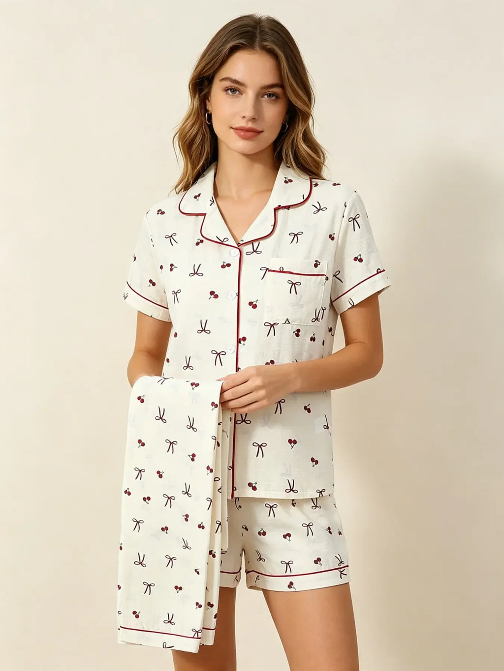 Three-Piece Cream Bow Print Pajama Lounge Set with Short-Sleeve Button-Down Top, Matching Shorts and Long Pants