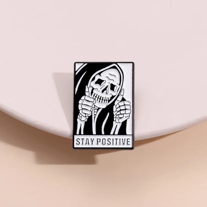 Stay Weird Skeleton Reader Gothic Enamel Pin for Alternative Fashion Styling