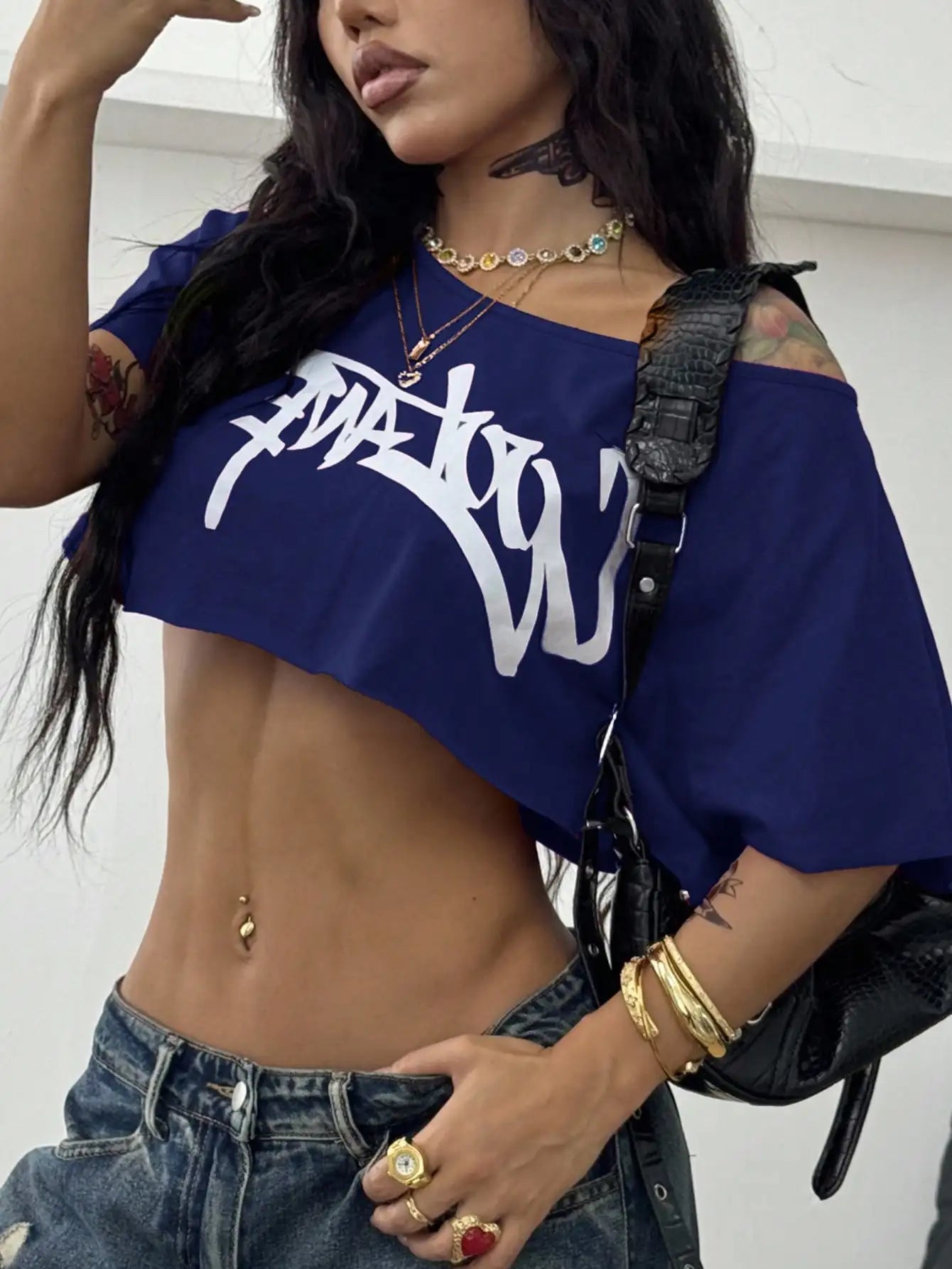 Off Shoulder Graphic Crop Tee with Relaxed Streetwear Inspired Silhouette