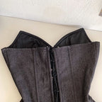 Dark Denim-Inspired Strapless Lace-Up Bustier with Asymmetrical Peplum Hem