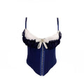 Vintage-Inspired Black Overbust Corset with White Ruffled Lace Trim