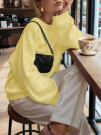 Women's Minimalist Crew Neck Knit Sweater with Relaxed Long Sleeve Silhouette