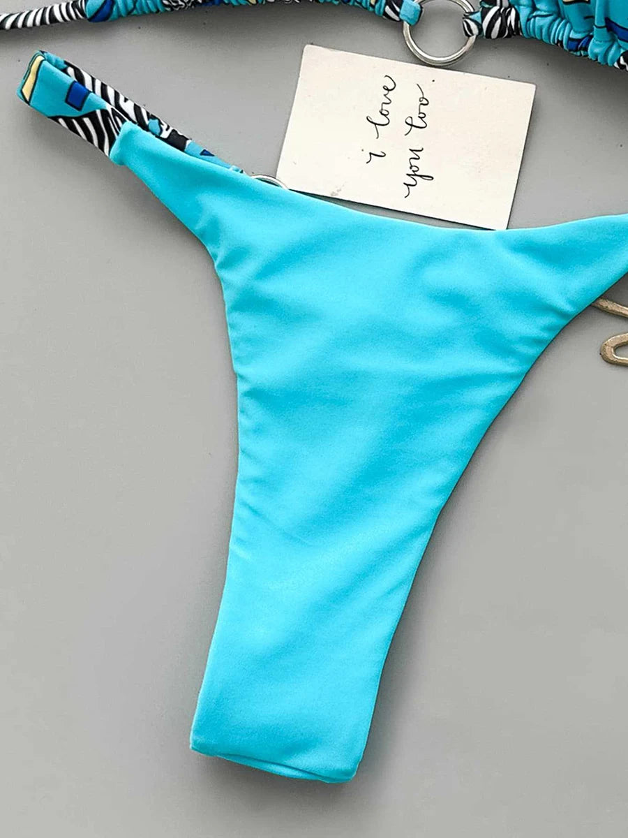 Mixed-Media Abstract Print and Turquoise String Bikini with Metallic Hardware