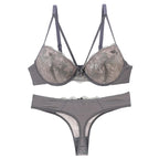 Sophisticated Navy Blue Embroidered Push-Up Bra and Thong Set with Strappy Accents