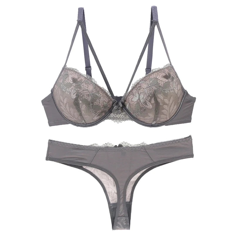 Sophisticated Navy Blue Embroidered Push-Up Bra and Thong Set with Strappy Accents